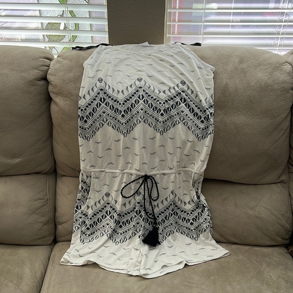 Swimsuit coverup romper with elastic waist and black tassel tie. - Picture 1 of 5